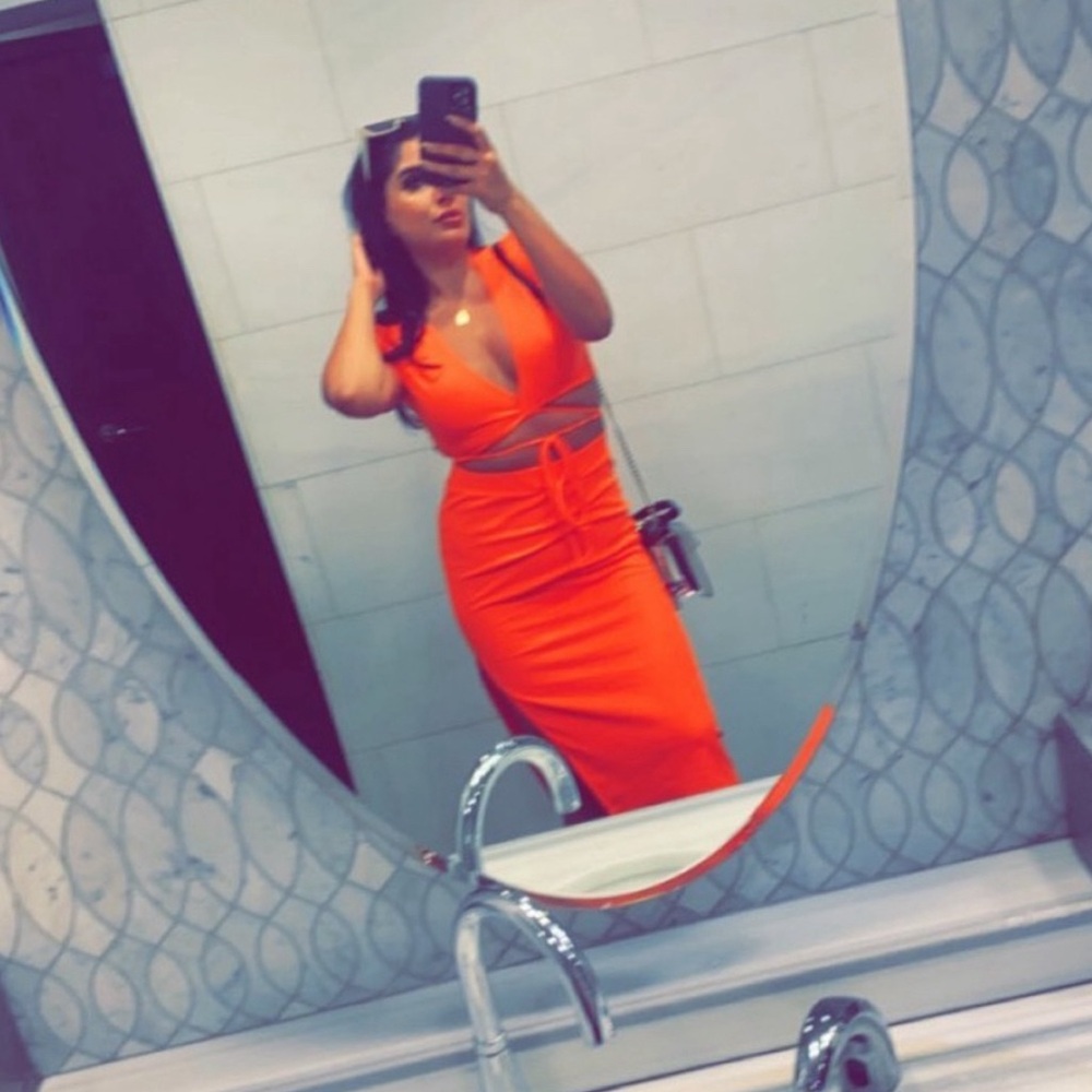 Orange wrap crop top and matching skirt set